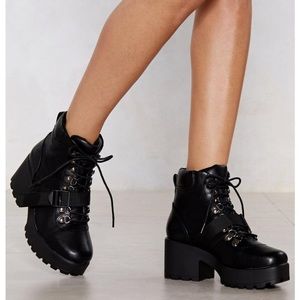 Platform faux leather boot with strap detail